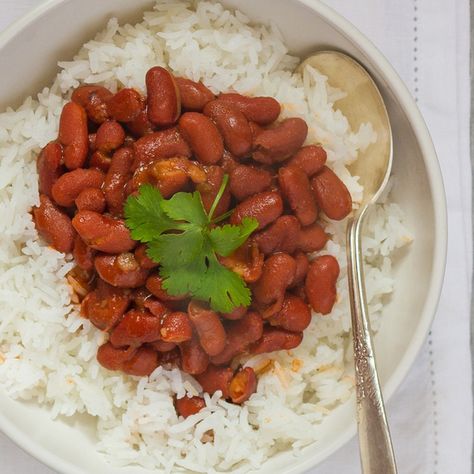 This quick, easy recipe for Puerto Rican-style red beans and rice is flavored with bacon, adobo seasoning and onion. Rice And Red Beans Recipe, Puerto Rican Red Beans, Beans And Rice Recipes, Red Bean And Rice Recipe, Red Beans Recipe, Recipes With Kidney Beans, Red Beans N Rice Recipe, Bean Dishes, Rice And Beans Recipe