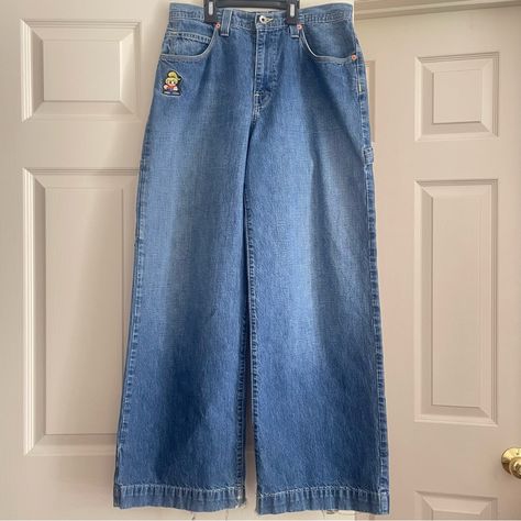 Jnco Fixin Girlie Stuff Denim Jeans Vintage Rare To Find Wide Leg Denim Pants, High Waisted, Cargo,Baggy, Slouchy Style, Zipper Closure, Pockets Front And Back. Very Good Vintage Condition, Legs Back Hem Have Been Distressed/Destroyed Due To Being Worn, Everything In Really Nice Condition.Pants Size 13 Fits Perfectly Size 30 , Or Size 29 And You Want A Loose Fit Look. - Size: 13= 29-30 - Medium Washed Color - 100% Cotton - Meade In Usa - Inseam: 30” - Leg Opening: 11” - Measurement Laying Flat - Jnco Jeans, Wide Leg Denim Pants, Grunge Jeans, 90s Jeans, Slouchy Style, Pants High Waisted, Baggy Pant, Cargo Jeans, Wide Leg Denim