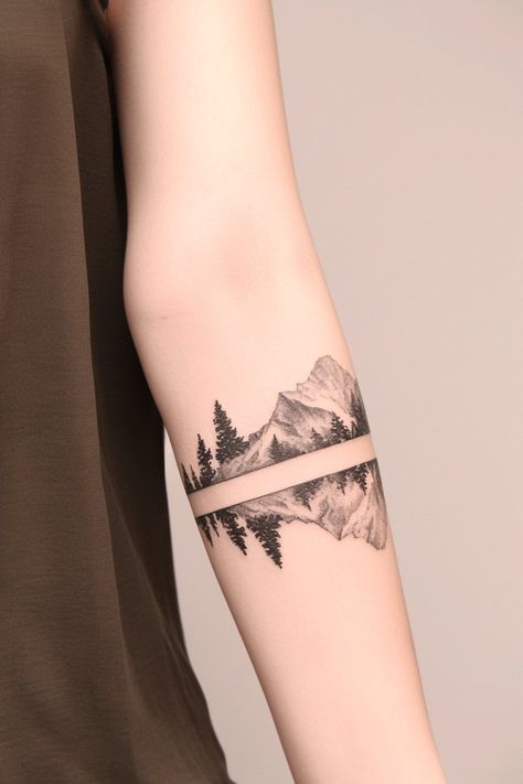 30 Small Mountain Tattoo Designs to Inspire Your Next Ink – Refined Aesthetique Mountains Around Arm Tattoo, Ankle Pine Tree Tattoo, Arm Band Mountain Tattoo, Trees Tattoo Forearm, Leg Mountain Tattoo, Boundary Waters Tattoo, Mother Daughter Mountain Tattoos, Minimal Mountain Tattoo Simple, Tree And Ocean Tattoo