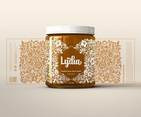 Lydia is a raw honey product from the Greek mountains, a naturally rich and biodiverse ecosystem. Bill Pappas represents all the flowers and plants that the local bees may create their honey from in a beautiful illustrative mural that wraps around the honey jar. Lydia Honey Branding & Packaging Design by Bill Pappas. Honey Label Design, Food Packaging Machine, Jam Packaging, Honey Logo, Honey Label, Honey Brand, Honey Packaging, Jar Packaging, Honey Design