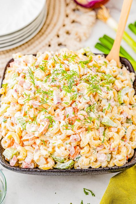 Classic Macaroni Salad - This fast and easy pasta salad recipe with tender elbow macaroni, bell peppers, carrots, celery, ham, and a super creamy dressing is a family FAVORITE! You can make it up to a day in advance if you want to get ahead and serve it at your next casual get together, backyard barbecue, picnic, potluck, or weeknight family dinner! Everyone always wants seconds! Picnic Potluck, Classic Macaroni Salad, Pasta Salad Ingredients, Elbow Pasta, Easy Pasta Salad Recipe, Carrots Celery, Creamy Dressing, Family Friendly Dinners, Pasta Salad Recipe