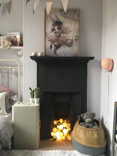 ideas for non working fireplaces, fairy lights Modern Fireplace Filler, Iron Fireplace Ideas, Small Victorian Fireplace, Small Faux Fireplace Ideas, Fairy Lights In Fireplace Ideas, Fireplace Fairy Lights, Fairy Lights In Fireplace, Fireless Fireplace Ideas, Antique Fireplace Mantle Ideas