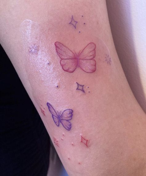 Purple And Pink Butterfly Tattoo, Purple Ink Tattoo Words, Purple Butterflies Tattoo, Pink Purple Tattoo, Blue And Pink Tattoo, Pink Tattoo Dark Skin, Pink Linework Tattoo, Pink Tattoo Healed, Purple Tattoo Aesthetic