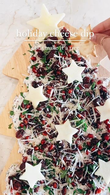 k r i s t e n on Instagram: "this holiday appetizer is so fun & festive • a perfectly delicious christmas tree cheese dip board • like the #butterboard but only better • the best part of this … you literally cannot mess it up, gang • a little mess is a-ok on this decked out tree start by spreading a soft cheese of your choice • i went with an herbed goat cheese • next layer the following ingredients: craisins, parsley, pomegranates, parmesan cheese, and apples for the stars you can use any g Goat Cheese Christmas Tree, Holiday Goat Cheese Board, Goat Cheese Christmas Board, Goat Cheese Board Ideas, Goat Cheese Board, Cheese Christmas Tree, Christmas Cheese Tree, Dip Board, Cheese Tree