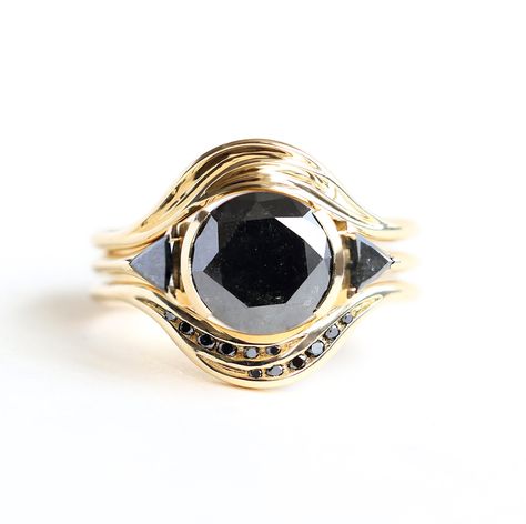 Unique Black Hole Diamond Ring Set in 18K gold. Customizable gemstones, ready to ship in 14K. Modern, alternative, and stunning wedding set. Jewelry Smithing, Black Diamond Ring Set, Black Diamond Engagement Ring Set, The Black Hole, Black Spinel Ring, Black Diamond Engagement Ring, Diamond Bridal Ring Sets, Diamond Ring Set, Spinel Ring