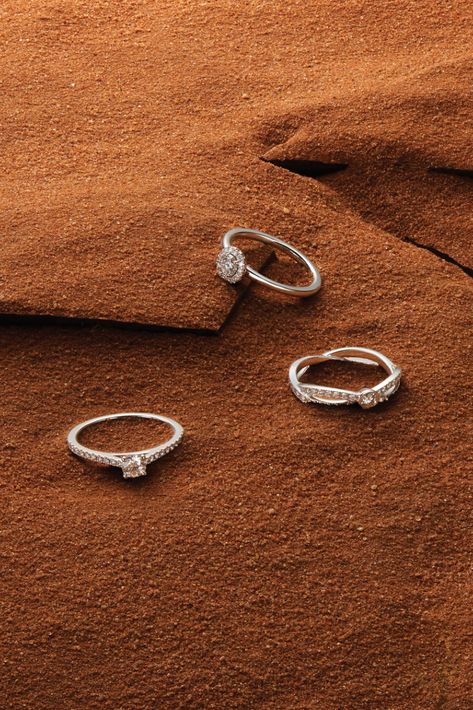 Silver Jewelry Photography Ideas, Bracelet Jewelry Photography, De Beers Engagement Rings, Sand Product Photography, Silver Jewellery Photography, Ring Product Photography, Debeers Engagement Ring, Rings Photography Ideas, Rings Story