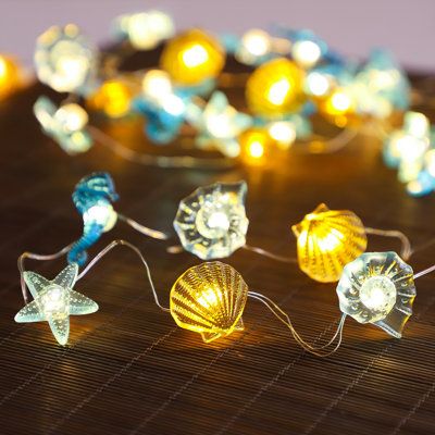 Package List: 1 x Conch seahorse starfish shell String Lights, 1 x Batteries Pack ( 3AA Batteries are not included), 1 x USB Cable, 1 x Remote Control The Holiday Aisle® | The Holiday Aisle® Hassiel 120" String Lights 120.0 W | Wayfair Sunshine Themed Bedroom, Nautical Bedroom Theme, Whimsical Beach House, Aquatic Room Decor, Boho Beach Room Decor, Spongebob Bathroom, Unique String Lights, Ocean Room Ideas, Coastal Room Decor