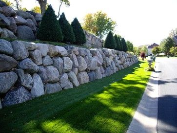 Boulder Retaining Wall modern landscape Landscaping With Boulders On A Slope, Rock Wall Landscape, Natural Stone Retaining Wall, Boulder Retaining Wall, Diy Retaining Wall, Rock Retaining Wall, Retaining Wall Design, Garden Retaining Wall, Concrete Retaining Walls