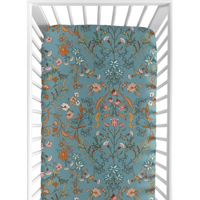 Boho floral wildflower fitted crib sheets will help complete the look of your Sweet Jojo Designs nursery. This multicolor wildflower print brushed microfiber sheet fits all standard crib and toddler mattresses and is machine washable for easy care. Color: Turquoise/Orange/Coral | Boho Floral Wildflower Fitted Crib Sheet by Sweet Jojo Designs, Microfiber in Blue | 52 H x 28 W in | Wayfair Maximalist Nursery, Hippie Nursery, Turquoise Nursery, Teal Nursery, Wildflower Nursery, Baby Toddler Bed, Floral Crib Sheet, Moon Pies, Baby Crib Bedding Sets