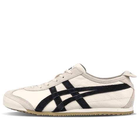 Introducing the Onitsuka Tiger Mexico 66 Vintage 'Birch Black'. This remarkable sneaker has been a classic since its debut in 1966. With a subtle color combination featuring a "Birch" upper and "Black" tigerstripes, these shoes bring cool to your everyday look. Crafted with a rich history, the Mexico 66 Vintage offers reliable comfort that's sure to turn heads. Be part of the cult and get your pair today! (SNKR/Unisex) Black Everyday Shoes, Men’s Footwear, Dark Sneakers, Onitsuka Tiger Shoes, Japan Shoes, Everyday Sneakers, Cool Sneakers, Tiger Mexico 66, Onitsuka Tiger Mexico 66