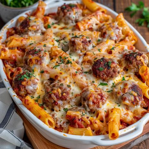 A delicious and comforting pasta dish made with ziti, meatballs, and melted cheese. Meatball Pasta Casserole, Cheesy Meatball Casserole, Baked Ziti With Meatballs, Italian Sausage Meatballs, Meatball Casserole Recipe, Cheesy Meatballs, Lauren Lane, Sausage Meatballs, Meatball Casserole