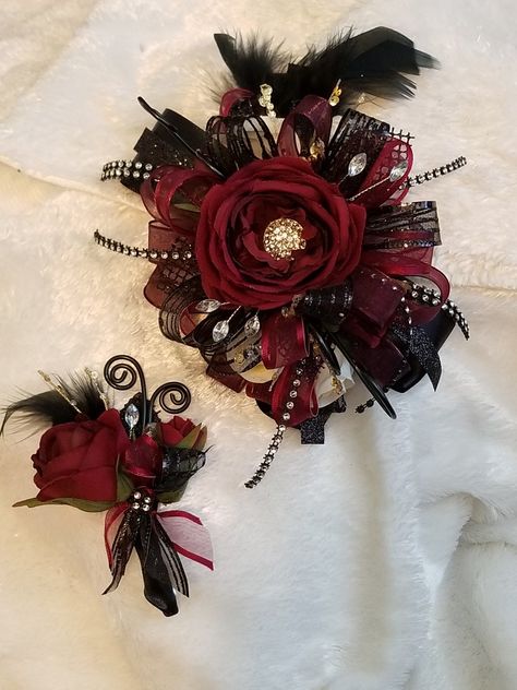 Burgundy Corsage Prom, Burgundy Corsage And Boutonniere, Goth Corsage, Black And Gold Corsage, Gothic Corsage, Burgundy Corsage, Red Corsages, Gold Corsage, Black Corsage