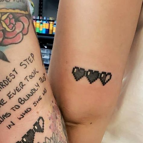 Jaynie on Instagram: "Had a great time doing these matching Zelda heart tattoos today! I can't wait to see you both next time 💕 #tattoo #tattoos #zeldatattoo #bfftattoos" Gamer Heart Tattoo, Game Heart Tattoo, Zelda Hearts Tattoo, Video Game Matching Tattoos, Tattoo For Gamers, Matching Gamer Tattoos, Zelda Heart Container Tattoo, Matching Video Game Tattoos, Zelda Heart Tattoo