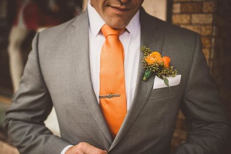 Gray Suit With Orange Tie, Navy Blue Tuxedo Wedding With Orange, Grey And Orange Suit, Gray And Burnt Orange Wedding, Grey And Burnt Orange Wedding, Grey Suit Orange Tie, Orange Groomsmen Attire, Grey And Orange Wedding, Orange And Gray Wedding