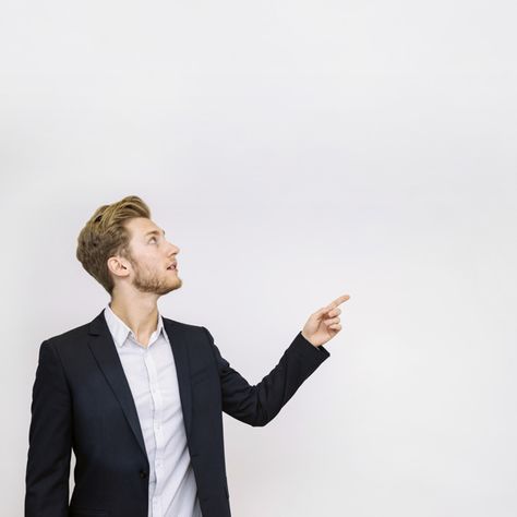 Portrait of young businessman pointing at something looking up Free Photo Man Pointing, Man Looking Up, Business Brochure Design, Blue Business Card, Modern Business Cards Design, Green Business, Modern Business Cards, Business People, Free Vectors