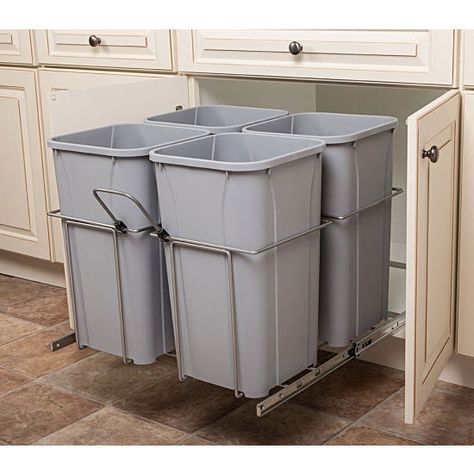 This Hafele Bottom Mount Soft Close Four Waste Bin unit features full extension ball-bearing slides with soft-close technology and 1'' over travel. Pre-assembled for faster installation, the bottom-mount slides also provide stability. Specialized wire framing holds the plastic bins securely in place, and the trash can includes a clip-on handle for easy pull-out. Hidden Trash Can Kitchen, Hide Trash Cans, Pull Out Trash Cans, Trash Can Cabinet, Pantry Organizers, Farmhouse Kitchens, Rev A Shelf, Kitchen Trash Cans, Waste Bin