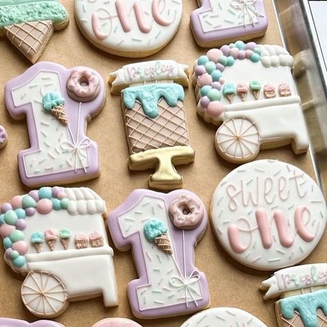 Danielle Gherardini on Instagram: "Presley is a “sweet one”! I am in love with the little ice cream and donut transfers 😍 • • • • #cookiedecorating #cookielove #talentedcookiers #sugarcookies #icingcookies #customcookies #designercookies #buttercookies #royalicing #cookiesofinstagram #royalicingart #sugarcookieart #cookieartist #edibleart #cookie #cookieart #decoratedcookies #decoratedsugarcookies #bakersofinstagram #royalicingcookies #instacookies #sugarcookiesofinstagram #sweetonecookies Sweet One Sugar Cookies, Sweet One Cookies, Cookie Bucket, Baby First Birthday Themes, Cutout Cookies, Girl Birthday Themes, First Birthday Themes, Donut Party, Ice Cream Cookies