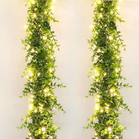 PRICES MAY VARY. PREMIUM MATERIAL: This upgraded eucalyptus garland is made of premium plastic, owning the waterproof and UV resistant quality. The fake garland will not wilt and fade without water and sunshine, so it is durable and reusable. It will keep a fresh and vivid look all year around to beautify your home. LIFELIKE APPREANCE: With the textured leaves and bright green color, the the faux hanging eucalyptus vines present a realistic and lush appearance. The leaves and stems with the natu Garland Above Kitchen Cabinets, Shrek Halloween, Faux Eucalyptus Garland, Above Kitchen Cabinet, Shrek Wedding, Hanging Eucalyptus, Kitchen Cabinet Decor, Outdoor Backdrops, Artificial Eucalyptus Garland