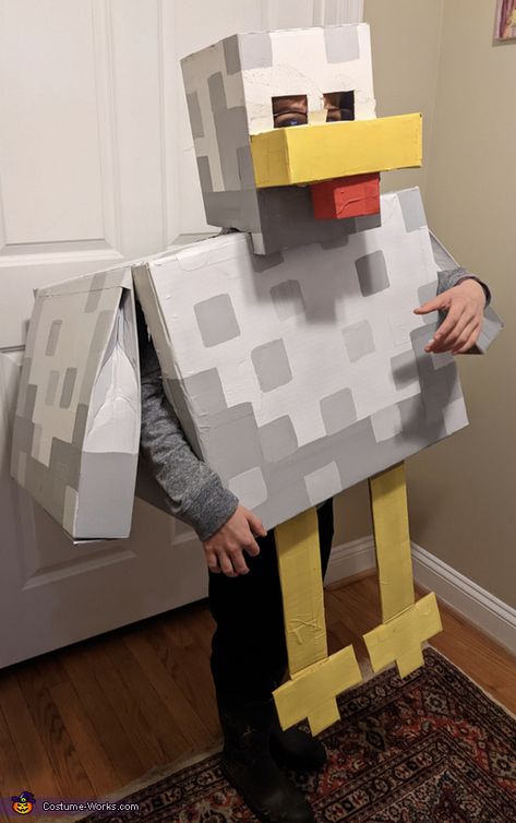 Rachel: My ten year old loves Minecraft so I made him a chicken costume with cardboard boxes to match with the fluffy chicken costume I made for his baby brother. Unfortunately... Adult Minecraft Costume, Cardboard Costumes Diy, Minecraft Costume Diy, Diy Minecraft Costume, Pig Costume Diy, Cardboard Box Costume, Cardboard Costumes, Minecraft Chicken, Homemade Costumes For Kids