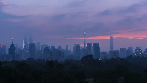 Time lapse: Foggy low clouds Kuala Lumpur city view during dawn overlooking the city skyline from afar with lushes green in the foreground. Federal Territory, Malaysia. Pan up motion timelapse. City Skyline Photography, Art Brainstorm, City Skyline At Night, Skyline Photography, Projector Photography, Panorama City, Landscape Reference, Kuala Lumpur City, Sky City