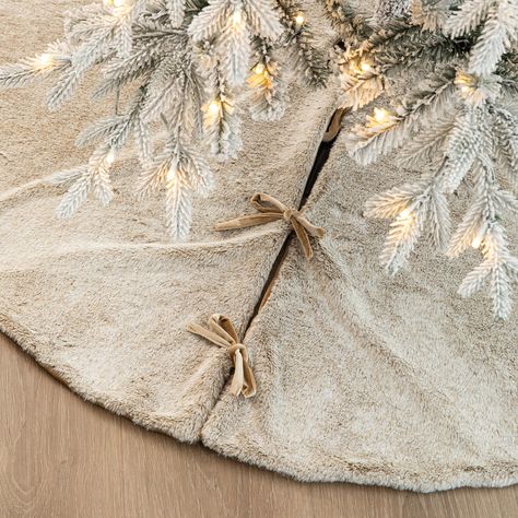 Get this Glitzhome® Faux Rabbit Fur Christmas Tree Skirt at Michaels. com. This Christmas tree skirt is designed to be placed around the bottom of your Christmas tree as a stylish protector against tree debris and as a mat for presents This Christmas tree skirt is designed to be placed around the bottom of your Christmas tree as a stylish protector against tree debris and as a mat for presents. The gorgeous and elegant faux rabbit fur makes it more soft and warm. Details: Available in multiple c