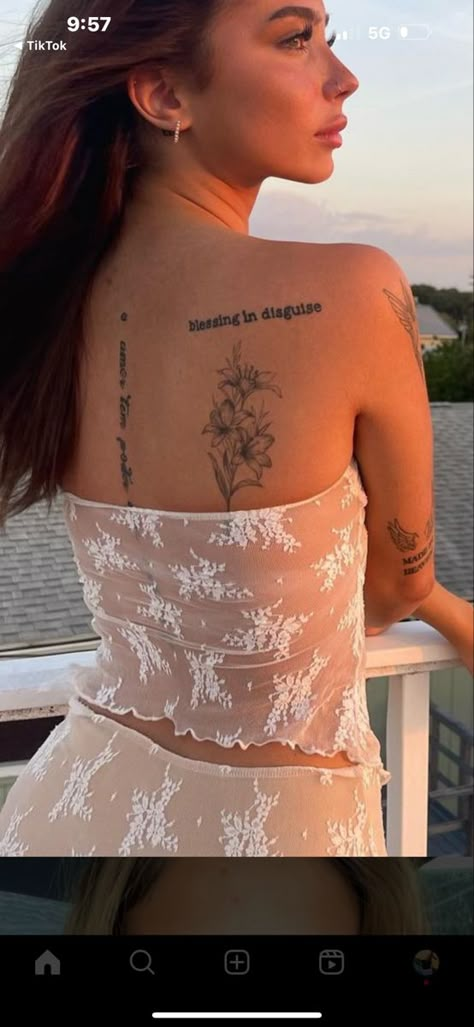 Should Flower Tattoo, Back Tattoos Flowers Women, Back Tattoo Women Scattered, Ginger Lily Tattoo, Godspeed Back Tattoo, Rib And Back Tattoos For Women, Backtattoos Back Women Flowers, Lily Back Tattoo For Women, Multiple Back Tattoos Women Placement