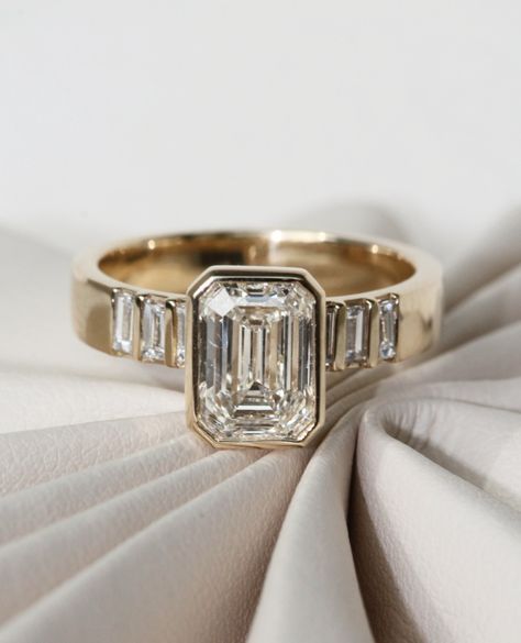 It's about time we showed off this June Studio project: a 2.07 carat emerald cut diamond with baguette accents, a bezel setting, and… | Instagram Cool Girl Engagement Rings, Panna Ring, Thick Band Engagement Ring, Wedding Stack, Ads Agency, Original Engagement Rings, Bezel Set Engagement Ring, Ring Cuts, Cute Engagement Rings