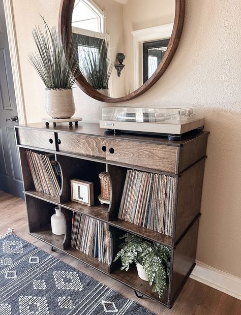 This elegant open storage option boasts a beautiful aesthetic and fits seamlessly into any room from entryways to laundry spaces. Our handcrafted cabinet provides an optimal organization solution. Every cubby is carefully constructed with an arched shape for effortless retrieval of items. Here is what you need to know about this listing to get you started:Credenza Record StorageFinish: shown - dark brownLength: 48 in.Depth: 16 in.Height: 38 in. high including the feet Cubbies are 13 high by 15 d Entry Way Credenza Decor, Entryway Credenza, Credenza Storage, Top Of Kitchen Cabinets, Credenza Decor, Record Storage Cabinet, Birch Cabinets, Cube Storage Unit, Hidden Compartments