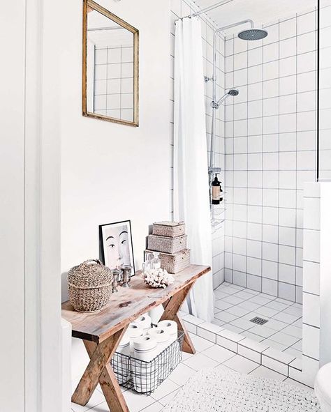 Simple accessories add personality to this small bathroom, with an old bench utilised as storage for wet room essentials. To see more of this Scandi-style home that mixes old with new, hit the link in our bio.  Styling - Luke Foged Photography - Morten Holtum/Living Inside Shower Bench Ideas, Bathroom Storage Bench, Bathroom Bench, Old Benches, Square Tiles, Scandinavian Bathroom, Wet Room, Shower Bench, Hall Bathroom