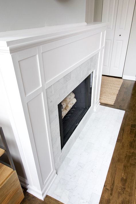 White Tile Around Fireplace, Fireplace Makeover Craftsman Style, White Fireplace Hearth, Half Fireplace Ideas, Marble Tile Around Fireplace, Marble Fireplace Tile, Grey Marble Fireplace Surround, Replacing Fireplace Surround, Fireplace Surrounds Tile