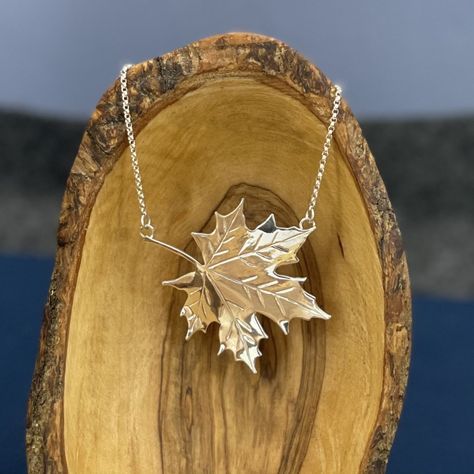 A perfectly shiny maple leaf centered on a rolo chain. Material: sterling silver Dimensions: 47mm x 44mm Chain Type: rolo Chain Width: 1.5mm Chain Length: 17.5" Finish: high polish Weight: 9.84g This handmade piece is a one of a kind! Even if I make something with a similar shape or layout, no two pieces will ever be exactly alike! Leaf Necklace Silver, Maple Leaf Necklace, Steampunk Accessories, Beaded Jewels, Leaf Bracelet, Hand Craft, Leaf Jewelry, Jewelry Lookbook, Leaf Necklace