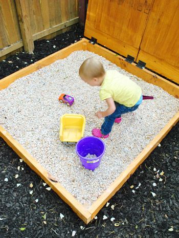 How To Build A Sandbox: Part 3 (The Rock Box Remix) | Not Using Sandbox Sand | Young House Love Build A Sandbox, Kid Organization, Rock Box, Living Pool, Outdoor Play Area, Young House, Young House Love, Pea Gravel, Backyard Play