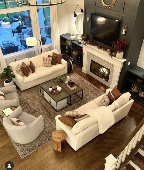 Furniture In Long Living Room, Two Story Living Room Furniture Layout, Two Matching Couches Living Room, Furniture Layout Large Living Room, Tv Above Fireplace Furniture Arrangement, Couch And Two Chairs Layout Tv, Square Shape Living Room Ideas, Living Room Decor With Ottoman, Sofa With Chaise Living Room Layout Cozy