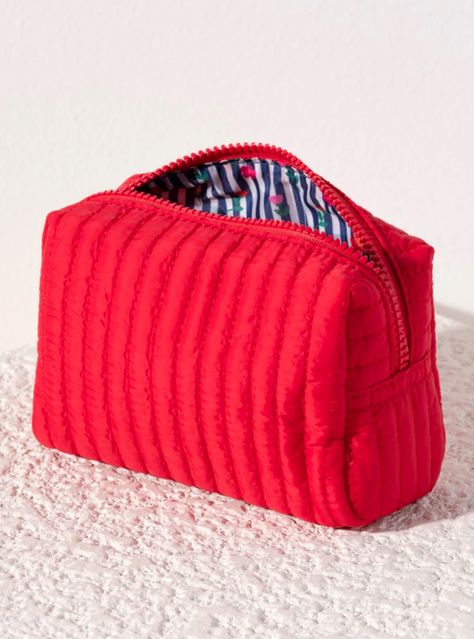 Perfect your on-the-go lifestyle with Shiraleah's Ezra Small Boxy Cosmetic Pouch. This pouch features a quilted nylon body and a boxy silhouette, perfectly matching the material throughout Shiraleah's Ezra collection. This handy pouch is perfect for storing your makeup, toiletries or any odds and ends that you may need during travel or on a daily basis! General Info: Features a top zip closure, 1 inner zip pocket, and 1 inner slip pocket Shiraleah is a trend-driven lifestyle brand focused on the little gifts that make life special! Made from nylon Measures L 7" x w 3" x h 4" Made in China Fancy Shop, Large Cosmetic Bag, Odds And Ends, Small Pouch, Ankle Boots Flat, Free People Shoes, Small Pouches, Fashion Jewelry Earrings, Cosmetic Pouch