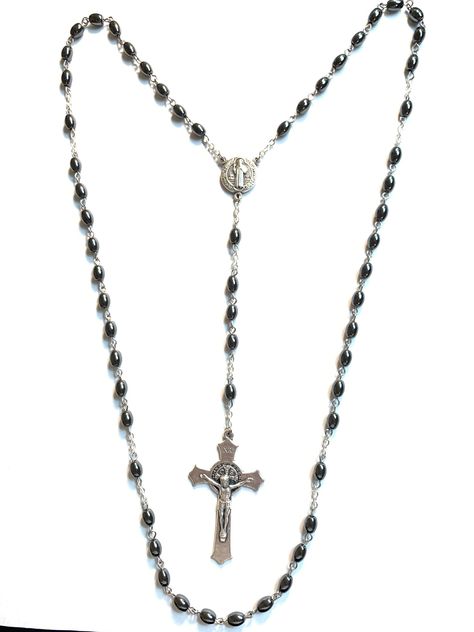 5 Decade St. Benedict Rosary made with 5mm x 8mm Hematite beads.  Eye-pins are stainless steel.  Chain is silver oxidized.  Cross and center are silver oxidized.  Cross is 2 inches and center is 3/4 inch.  Both are made in Italy. Decade Rosary, St Benedict, Catholic Rosary, Rosary Catholic, Eye Pins, Rosary Beads, Hematite Beads, Prayer Beads, Steel Chain