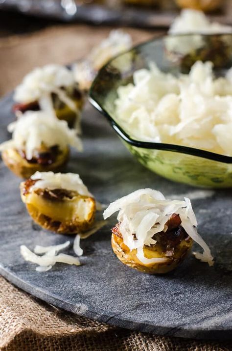 Fall and football season are almost here again, and these mini German Potato Skins can be found on the snack table! Super crispy baby potatoes covered in caramelized onions, beer-braised bratwurst, and a pile of sauerkraut make Game Day so much more delicious! Crispy Baby Potatoes, Oktoberfest Appetizer, Oktoberfest Recipes, German Appetizers, Fall And Football, Fall Party Food, Potato Appetizers, Oktoberfest Food, German Potato