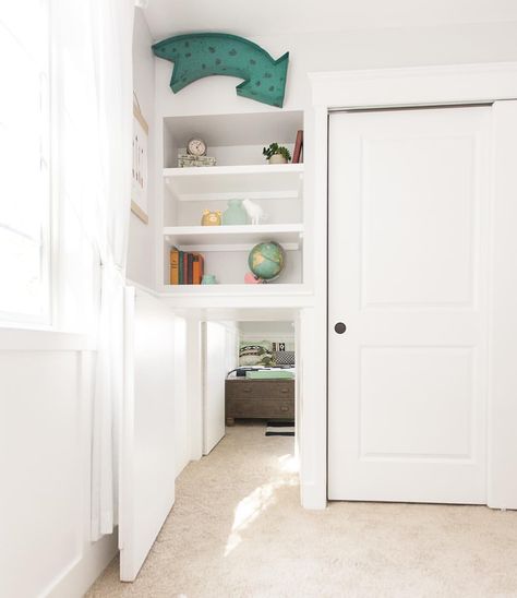 Here's a shot of the secret tunnel between bedrooms. This was an idea our kids thought of that we were able to incorporate into the house. We slightly modified the bedroom closet to accommodate the tunnel. The doors on each end were "disguised" with wainscot trim and secured with magnetic spring latches. It was a seamless look that only revealed the hidden tunnel when the doors were opened. Hours of fun for children (and adults too)! #hgtv #lovehgtv #hgtvrafterhouse Secret Rooms In Houses, Hidden Tunnel, Wainscoting Stairs, Wainscoting Bedroom, Secret Passage, Kids Door, Bear Bed, Dining Room Wainscoting, Wainscoting Styles