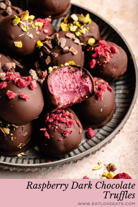 These raspberry dark chocolate truffles are super easy to make and are wonderfully vibrant. The raspberry white chocolate ganache centre is sweet and tangy which perfectly matches the crisp dark chocolate on the outside. These chocolate truffles make for the perfect Valentine's day gift or treat to enjoy after your meal. They store well too so you can make them ahead of time. | eatloveeats.com Raspberry Dark Chocolate, Dark Chocolate Truffles, Freeze Dried Raspberries, Molten Chocolate, Dried Raspberries, Valentines Day Desserts, Truffle Recipe, White Chocolate Raspberry, Snacks Saludables