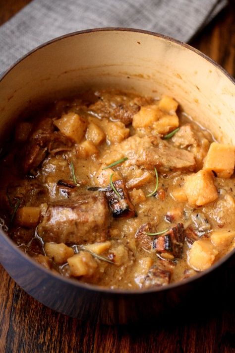 This pork stew recipe has a rich, sweet broth made with hard apple cider, bourbon, and rosemary. The combination cannot be beat. Pork And Apple Stew, Parsnip Stew, Apple Stew, Apple Cider Bourbon, Hard Cider Recipe, Pork Apple, Pork Stew Recipes, Hard Apple Cider, Pork Stew