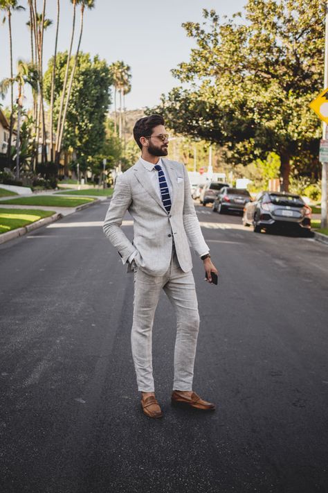 Live Action Getup: Ditching the Stuffy Suit Loafers With Suit Men's Fashion, Sand Linen Suit, Knit Tie Outfits Mens Fashion, Loafers Suit Men, Linen Suit With Tie, Suit With Loafers Men, Light Grey Linen Suit, Spring Suits Men, Gray Mens Suit