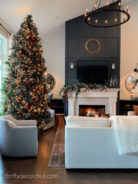 Christmas Living Room With Fireplace, Great Room Christmas Tree, Where To Place Christmas Tree In House, Christmas Tree Placement In Living Room, Dark Fireplace Mantle, Family Room Christmas Decor, Molding Fireplace, 12 Foot Christmas Tree, Glamorous Christmas Decor