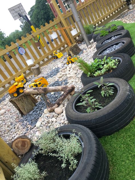 Tyres In Garden Ideas, Outdoor Classroom Garden, Tyres Recycle Garden, Sensory Backyard Ideas, Construction Play Area Outdoor, Tyres Eyfs Outdoor Areas, Outdoor Truck Play Area For Kids, Rock Pit Play Area, Dirt Pit For Kids Outdoor Play