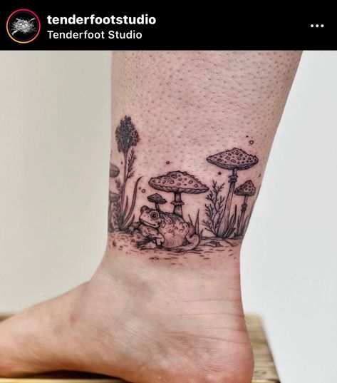 Toad and mushroom ring tattoo Mushroom Inspired Tattoos, Mushroom Hand Tattoos For Women, Mushroom Tattoo Around Arm, Mushroom Field Tattoo, Earthy Ankle Tattoo, Veggie Tales Tattoo, Fern Wrap Around Wrist Tattoo, Ankle Ring Tattoo, Mushroom Scene Tattoo