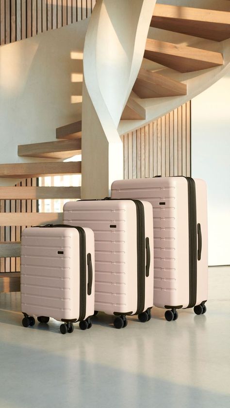 Antler Stamford set of three suitcases in Cabin, Medium and Large, sit one in front of the other, at the foot of a winding staircase. Pink Suitcase Set, Suitcase Set Aesthetic, Suitcase Set For Women, Cute Luggage Sets, Suitcases Aesthetic, Suit Cases Travel, Luggage Sets Cute, Suitcase Aesthetic, Trendy Luggage