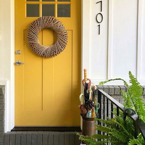 This is my parent’s front door. The color is “Solid Gold”, by Behr. Many people asked last August when I first posted this photo, but I… Bold Front Door Colors, Bold Front Door, Yellow Front Door, Bright Front Doors, Best Front Door Colors, Exterior Door Colors, Tan House, Yellow Front Doors, Best Front Doors