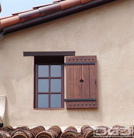 Spanish Colonial Exterior, Spanish Style Exterior, Custom Garage Doors, Garage Door Types, Spanish Decor, House Shutters, Wood Garage Doors, Garage Door Design, Colonial Exterior