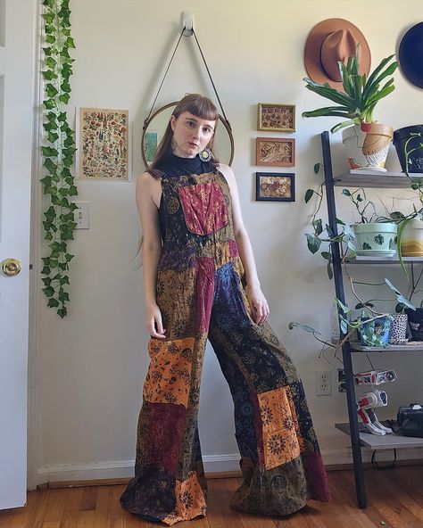 Step into celestial magic with our patchwork wide-leg jumpsuit—boho whimsy at its finest! 🔗https://karmanepalcrafts.com/collections/jumpsuits/products/patchwork-celestial-mushroom-wide-leg-bell-bottom-jumpsuit #celestial #patchwork #wideleg #jumpsuit #70sfashion #90svibes #funkystyle #dungarees #whimsygoth #autumnvibes Boho Overalls Outfits, Mushroom Overalls, Hippie Outfits Plus Size, Practicum Outfit, Goth Hippie Outfits, Patchwork Overalls, Punk Aesthetics, Plus Size Hippie, Wide Leg Overalls