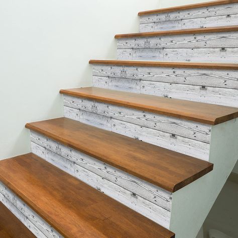 PRICES MAY VARY. Size: 7.87"x118", 2 strips. Can decorate 6 stair steps (39.37inch in length), can cover 12.91 sq.ft when use to furniture decoration. Not thick vinyl, but perfect for hiding defects since it made of black backing PVC. Just peel and stick. They are not boards but stickers. Can be freely cut and DIY according to needs. Use on stairs steps, headboard, wall, smooth tiles, glass, metal, smooth wood, etc. Faux weathered wood sticker, not real wood. Only suitable for smooth, flat and d Vinyl Stair Risers, Staircase Decals, Stair Riser Vinyl, Farmhouse Stairs, Diy Tile Backsplash, Vinyl Stairs, Stair Decals, Stairs Renovation, Stair Riser Decals