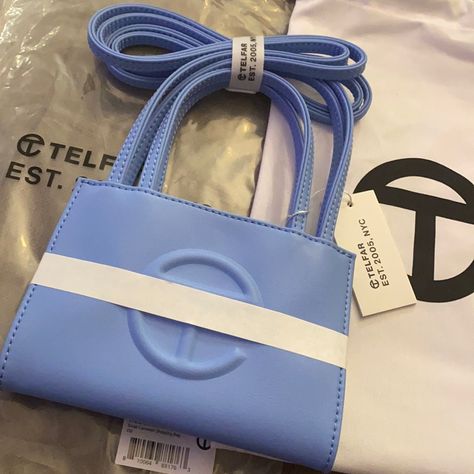 Mint Condition, Unworn And Tagged. Think Of North Carolina Blue. She’s A Beauty. Can Be Worn In The Winter, Spring And Or Summer. A Pop Of Color #Chefskiss #Telfar #Blackownedbusiness Blue Girly Things, Telfar Bags, Handbag Essentials, Girly Bags, Blue Purse, Fancy Bags, Cute Nikes, Pretty Bags, Cute Purses