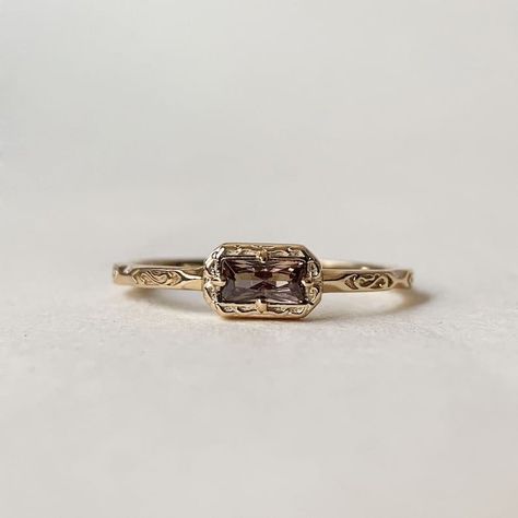 Baguette Ring, Vintage Filigree Solitaire Ring, Brown Cubic Zirconia Ring, Stackable Gold Sterling Silver Ring, Stacking Wedding Band Ring Details: - Center Stone: brown cubic zirconia - Stone Size: 6*4 mm - Shape: Emerald Cut If you have any questions, please let me know and I will be happy to help you. https://www.etsy.com/shop/THEJEWELLERPARK?ref=seller-platform-mcnav ● We Do Take Custom Orders ● Crafted with love & care for your special ones" ● For Other Metal kindly message us for a Custom Order request ● Exclusive engagement rings and wedding bands from Credence jewels. When a couple gets married they are king and queen of their world, ready to reign over their new life. This is the concept behind Credencejewels creating jewelry fit for royalty. ● Everything has to come together perf Brown Engagement Rings, Exclusive Engagement Rings, Brown Diamond Ring, Brown Rings, Stacked Wedding Bands, Diamond Rings Design, Baguette Ring, Zierlicher Ring, Topaz Engagement Ring